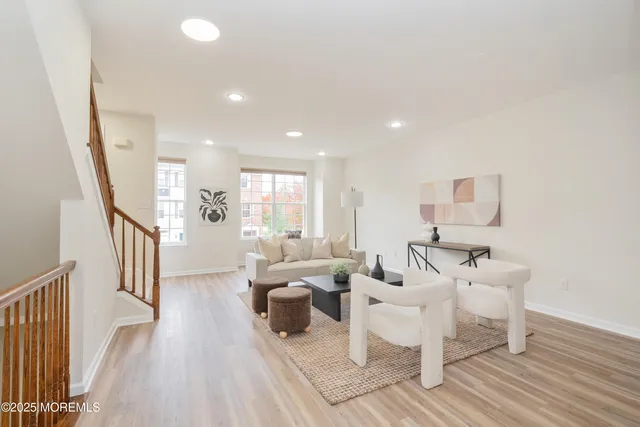 a living room with furniture and a table