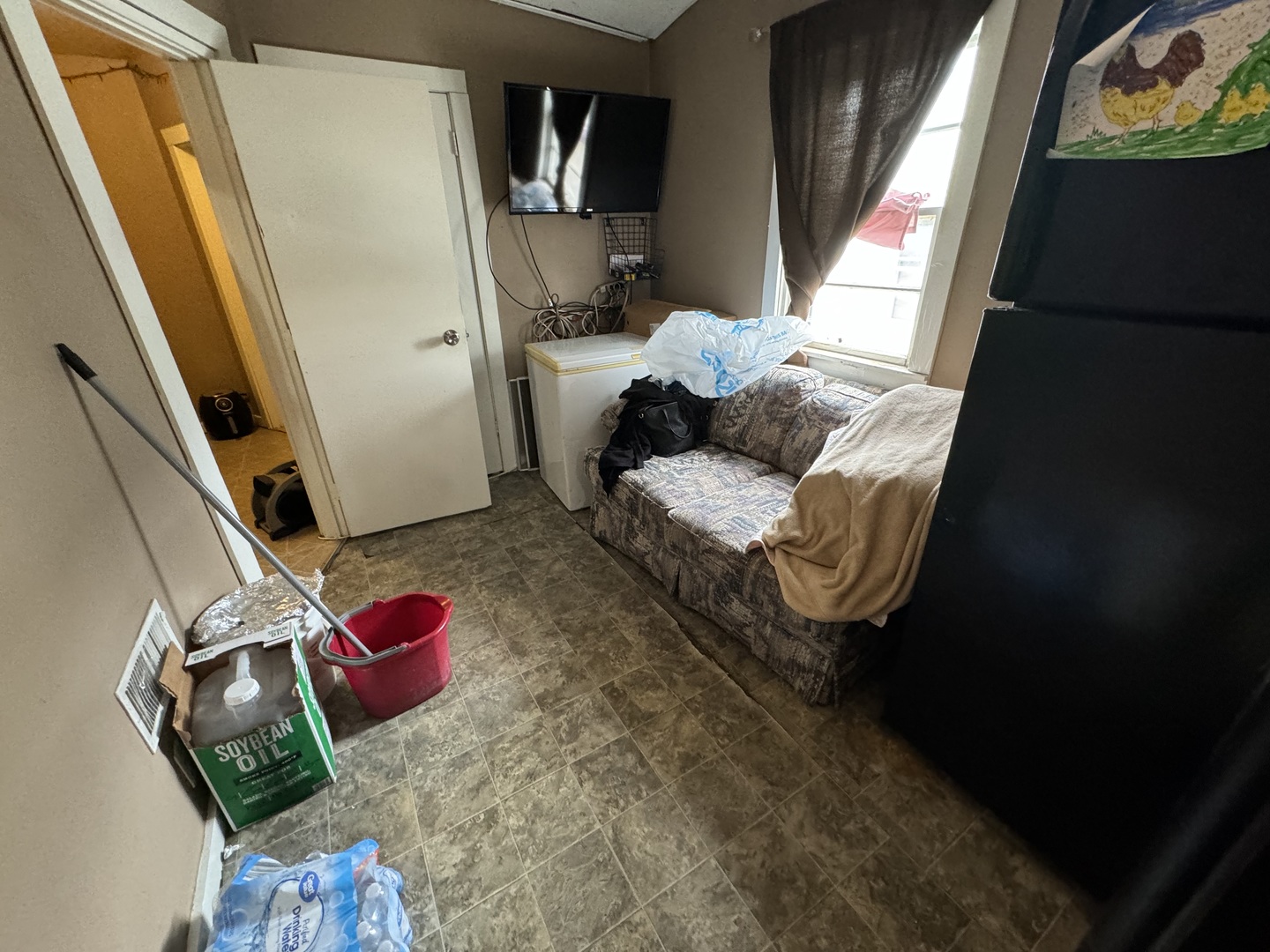 1112 Market Street DeKalb, IL 60115 - Photo 12 of 18 a bed room with a bed and a window