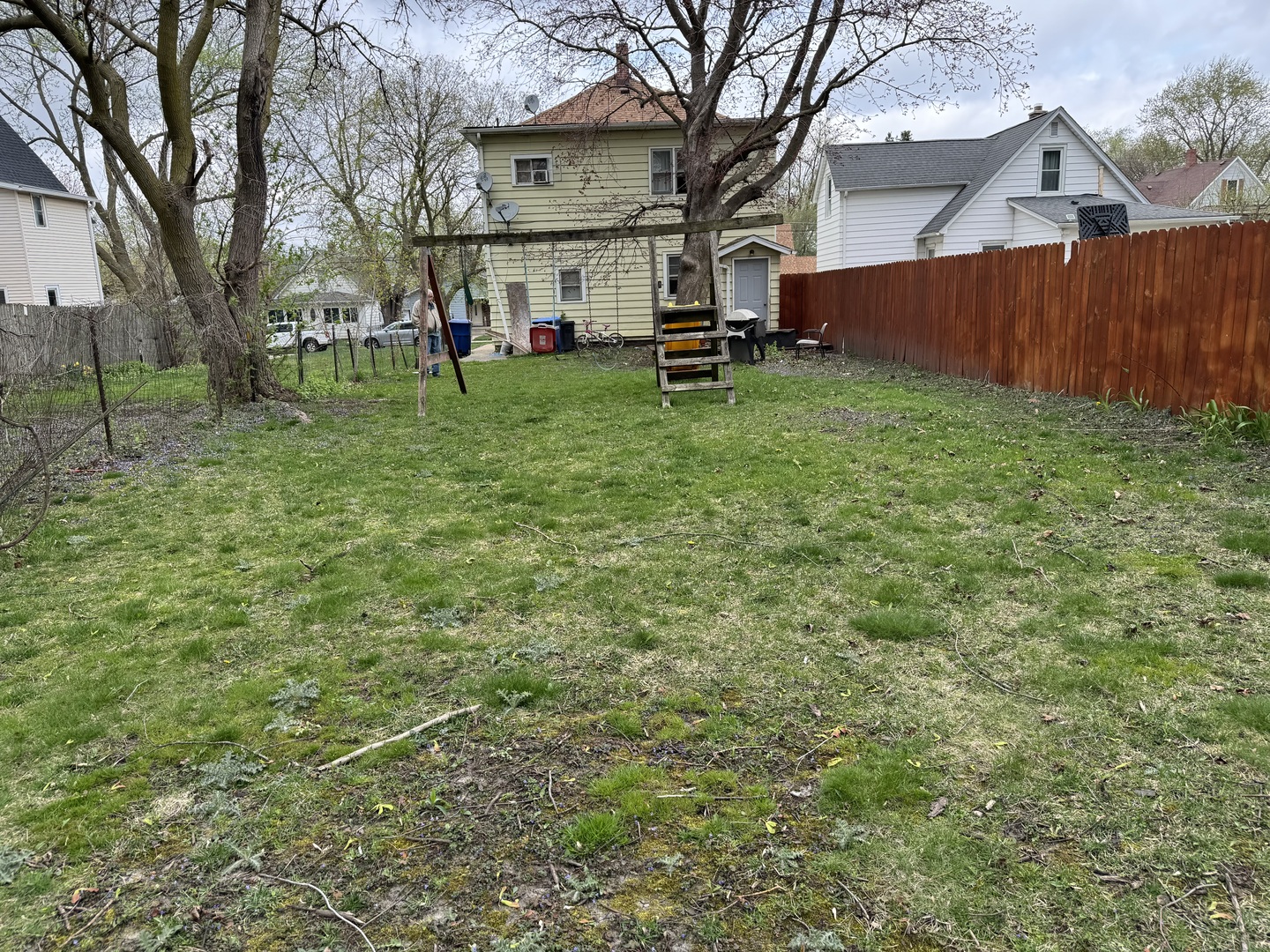 1112 Market Street DeKalb, IL 60115 - Photo 17 of 18 a view of a building with a yard