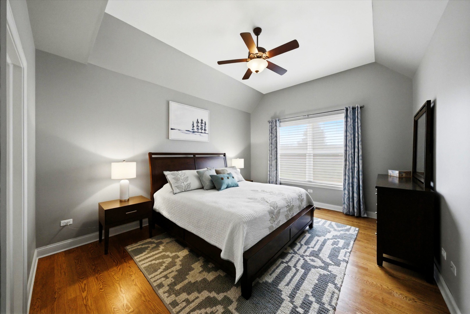 2061 Windham Circle Wheaton, IL 60187 - Photo 13 of 35 a bedroom with a bed and a chandelier