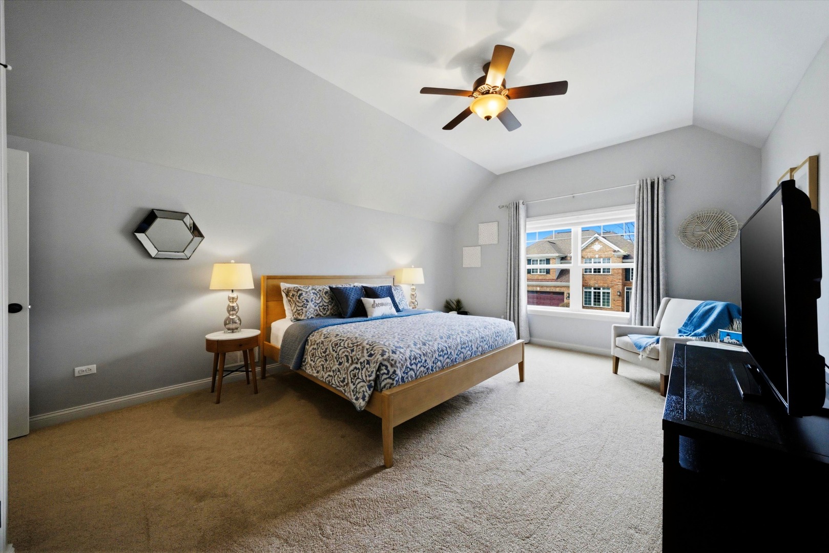 2061 Windham Circle Wheaton, IL 60187 - Photo 24 of 35 a bedroom with a bed and a chandelier