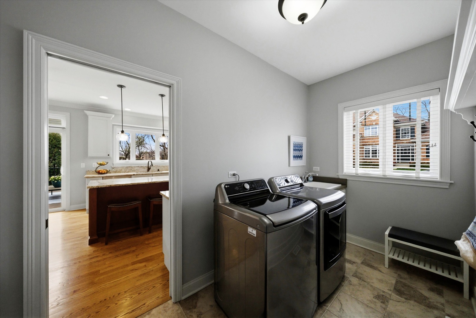 2061 Windham Circle Wheaton, IL 60187 - Photo 27 of 35 a kitchen that has a sink and a stove in it