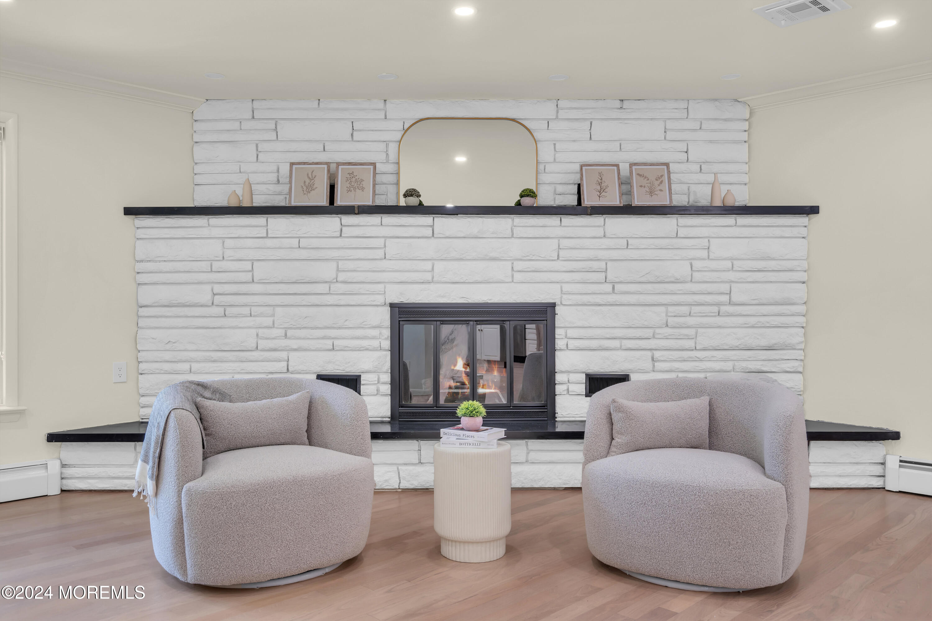 7 Lakeview Drive Jackson, NJ 08527 - Photo 11 of 67 a living room with furniture and a fireplace