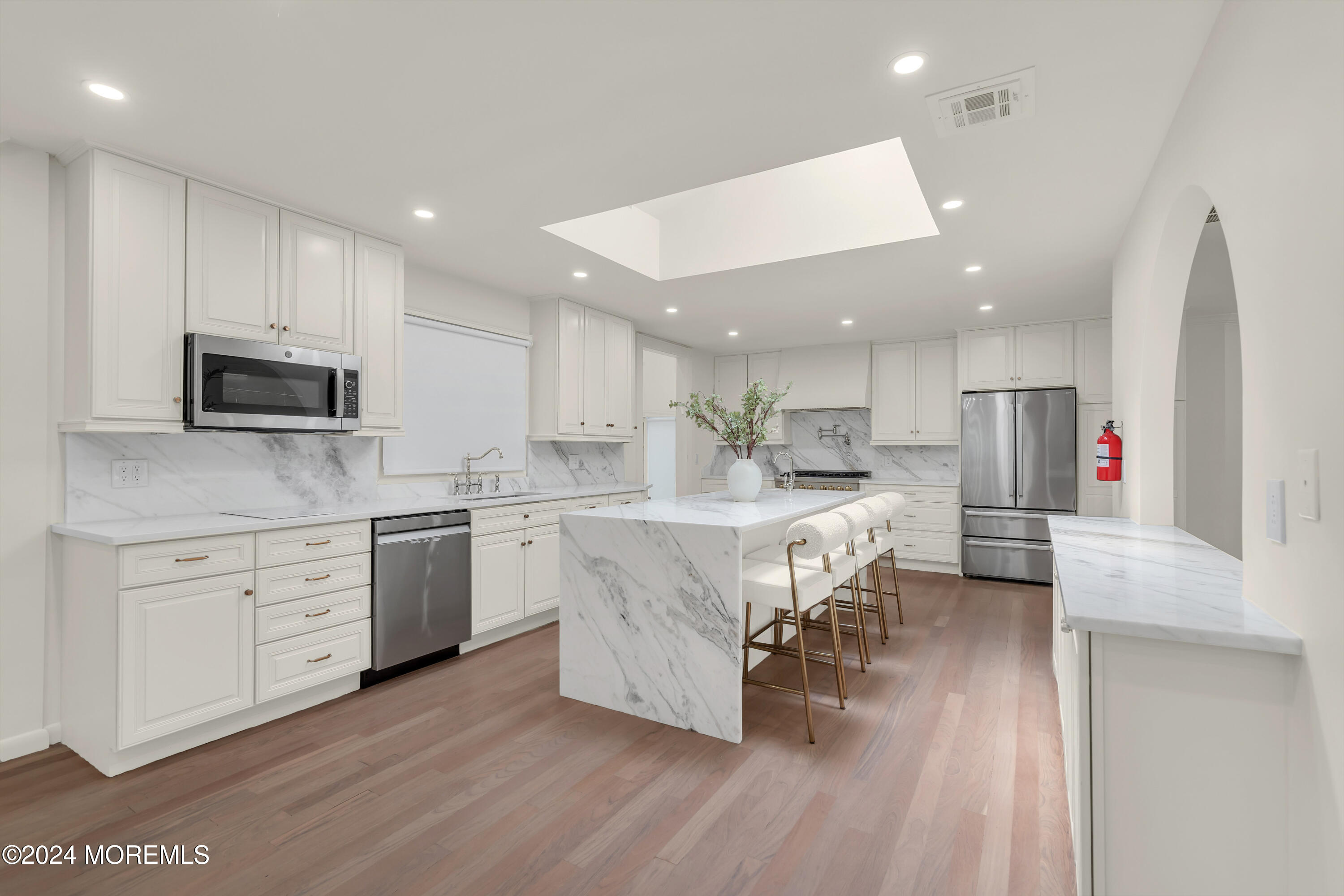 7 Lakeview Drive Jackson, NJ 08527 - Photo 21 of 67 a large kitchen with cabinets table and chairs