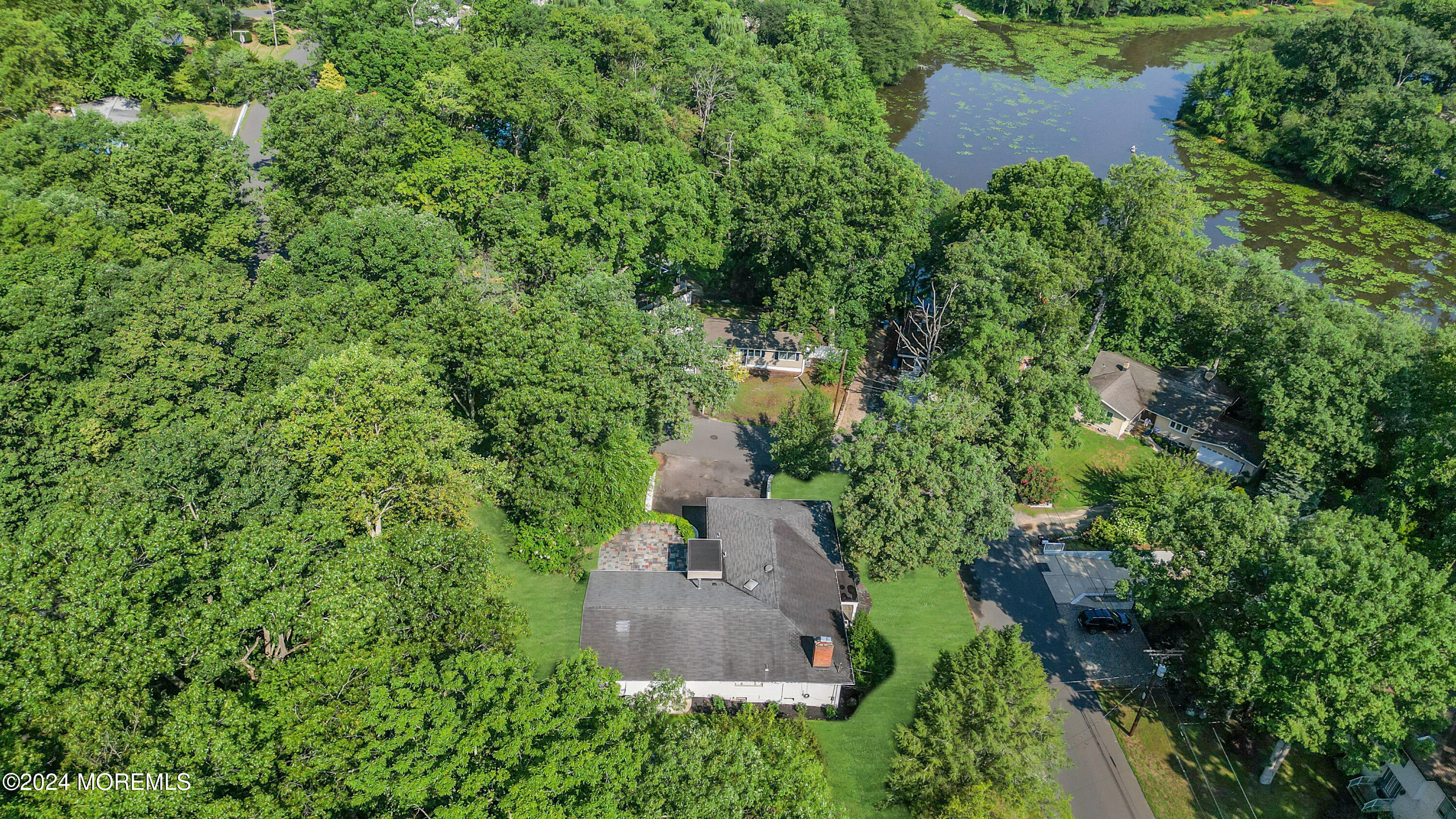 7 Lakeview Drive Jackson, NJ 08527 - Photo 3 of 67 an aerial view of a house with a yard and garden