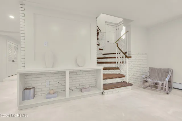 a utility room with sink dryer and washer