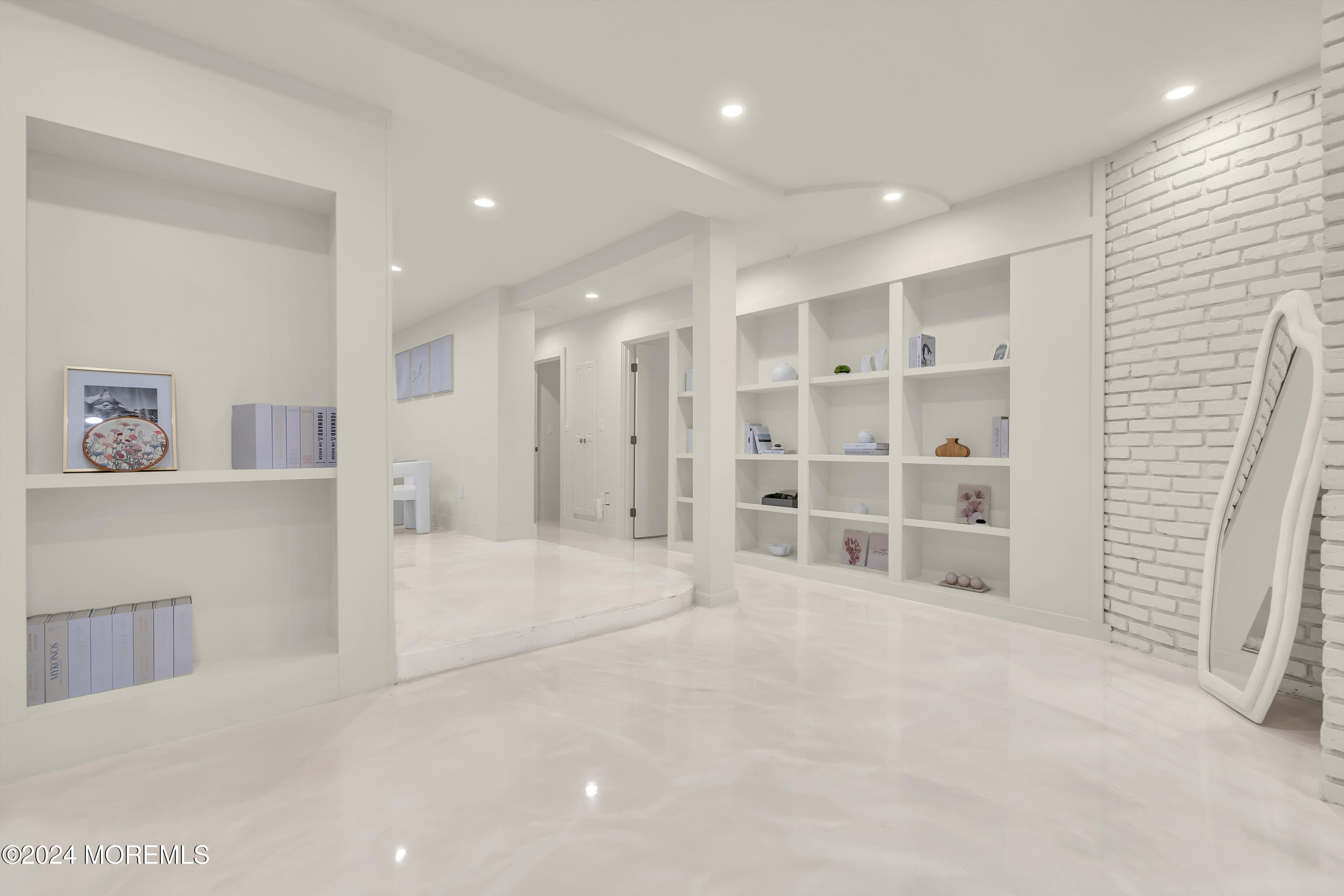 7 Lakeview Drive Jackson, NJ 08527 - Photo 49 of 67 a view of an empty room with a cabinet and mirrors