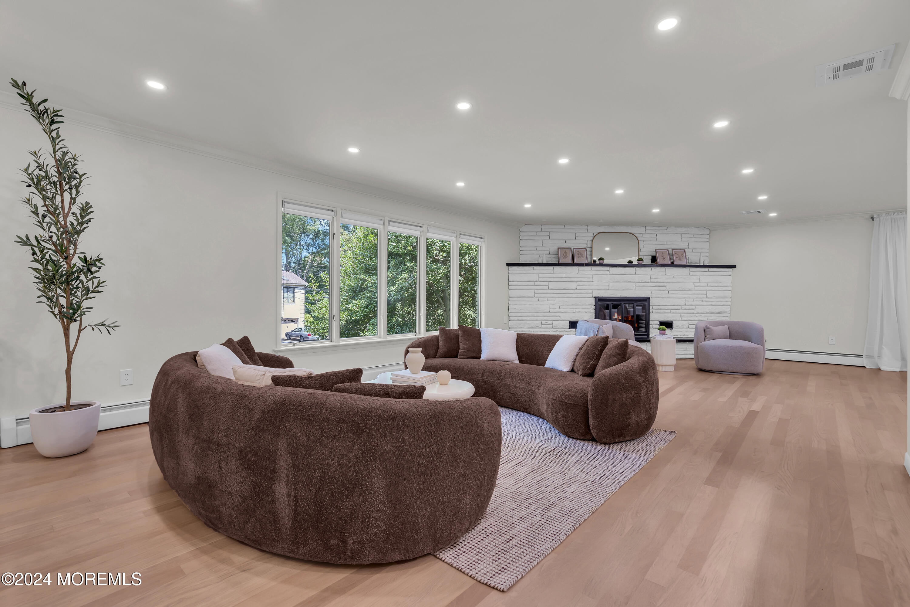 7 Lakeview Drive Jackson, NJ 08527 - Photo 10 of 67 a living room with furniture and a large window