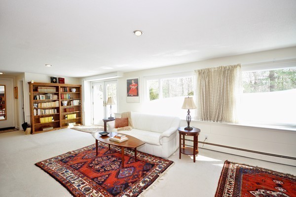 20 Deerhaven Road Lincoln, MA 01773 - Photo 17 of 25 a living room with furniture and a rug