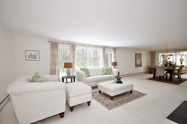 20 Deerhaven Road Lincoln, MA 01773 - Photo 3 of 25 a living room with furniture and a large mirror next to a window