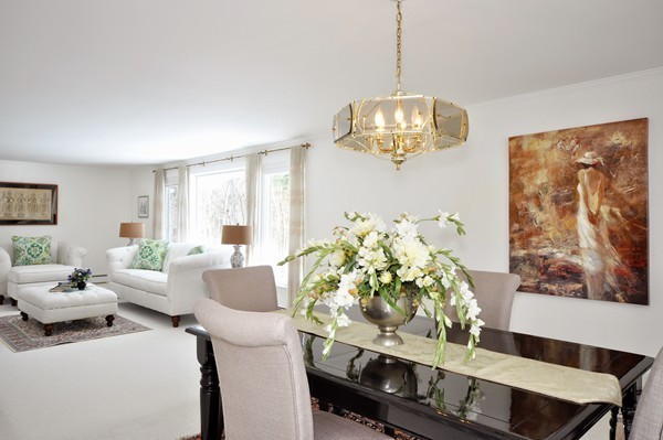 20 Deerhaven Road Lincoln, MA 01773 - Photo 4 of 25 a living room with furniture and a chandelier