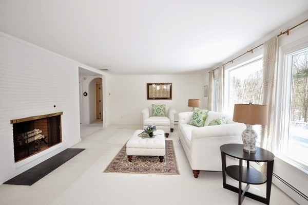 20 Deerhaven Road Lincoln, MA 01773 - Photo 5 of 25 a living room with furniture and a fireplace