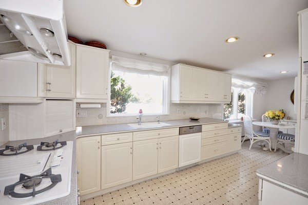 20 Deerhaven Road Lincoln, MA 01773 - Photo 8 of 25 a kitchen with a sink and cabinets