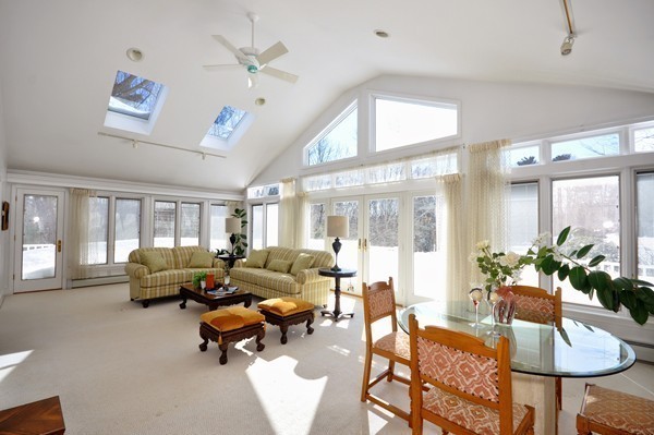 20 Deerhaven Road Lincoln, MA 01773 - Photo 9 of 25 a living room with furniture and a large window