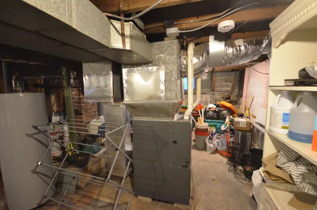 a view of a chairs and table in a room