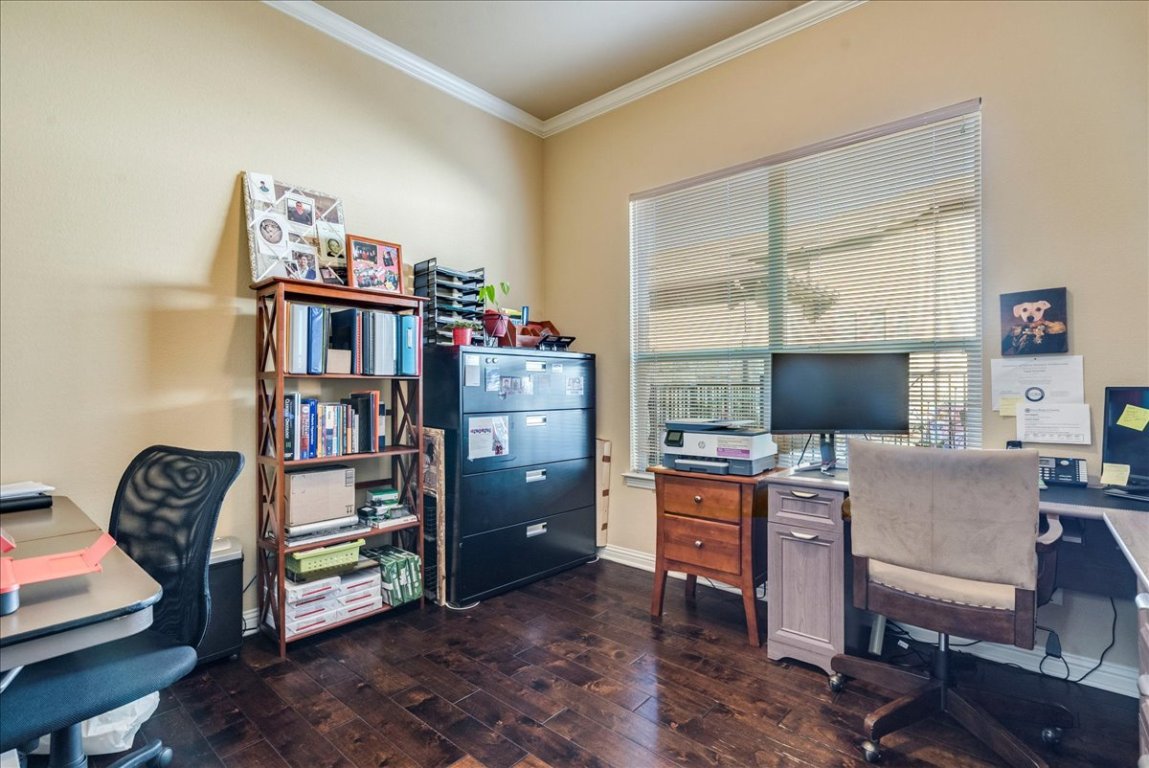 307 Duffy Lane Austin, TX 78738 - Photo 14 of 40 Office with crown molding and dark wood-type flooring