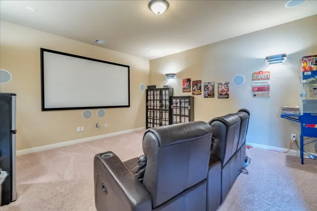 a view of a livingroom with workspace and a couch