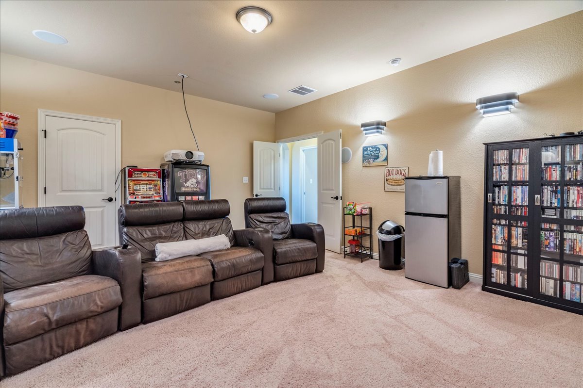 307 Duffy Lane Austin, TX 78738 - Photo 26 of 40 a living room with furniture and a ceiling fan