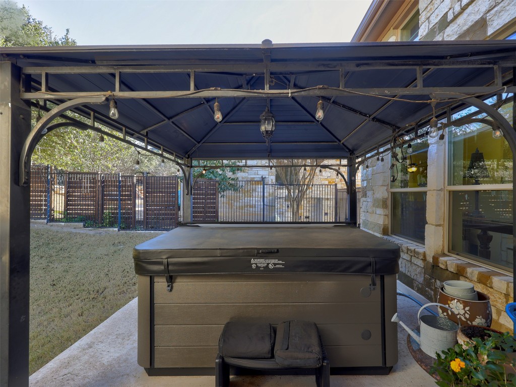 307 Duffy Lane Austin, TX 78738 - Photo 31 of 40 View of patio with a hot tub and a gazebo