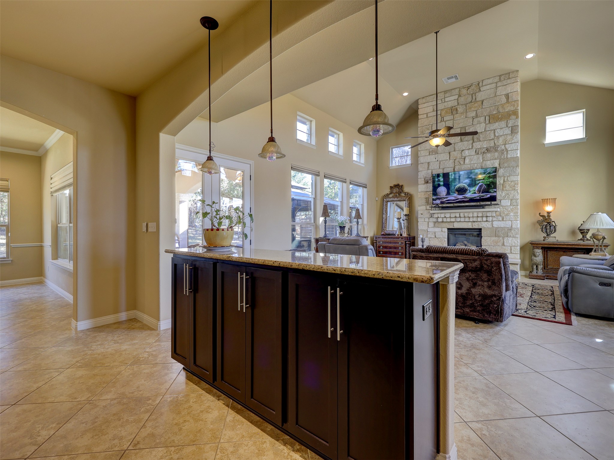 307 Duffy Lane Austin, TX 78738 - Photo 10 of 40 a kitchen with stainless steel appliances granite countertop a stove a sink and a refrigerator