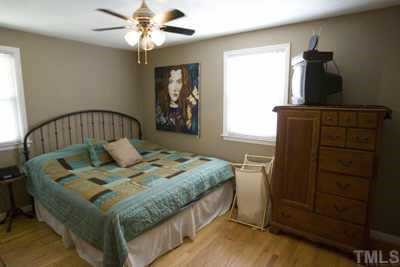 2260 Rumson Road Raleigh, NC 27610 - Photo 7 of 12 The master bedroom has refinished hardwood floors and a new ceiling fan Other