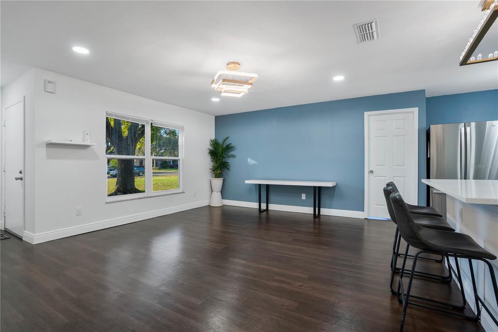 1213 Baranova Road Ocoee, FL 34761 - Photo 6 of 31 a view of a livingroom with furniture and window