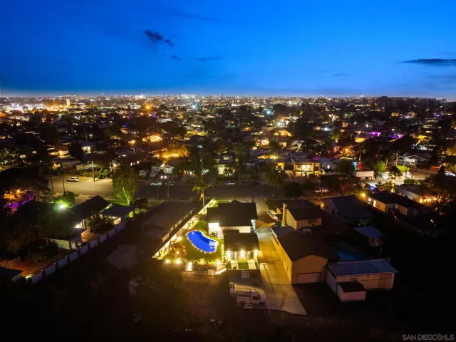 an aerial view of a city with lots of residential buildings
