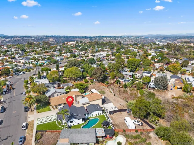 a view of an chairs in a backyard