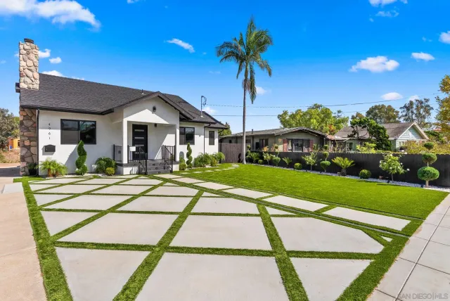 a bathroom with a sink tub and shower