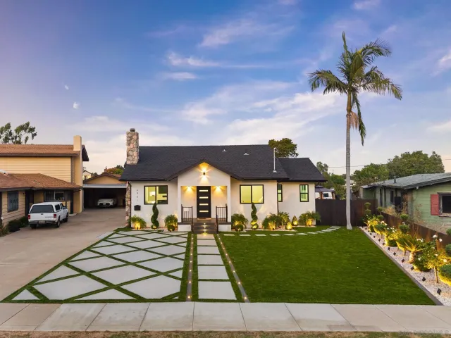 a bedroom with a bed and a chair