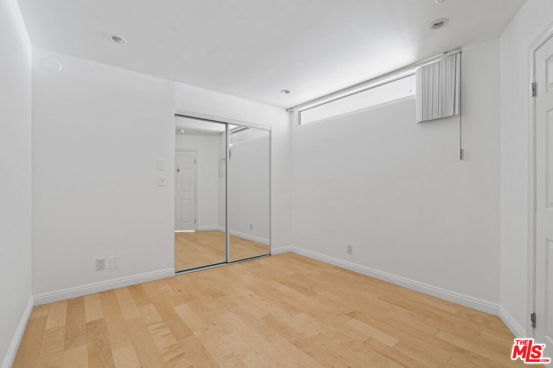 10747 Wilshire Boulevard, Unit 805 Los Angeles, CA 90024 - Photo 10 of 14 a view of an empty room