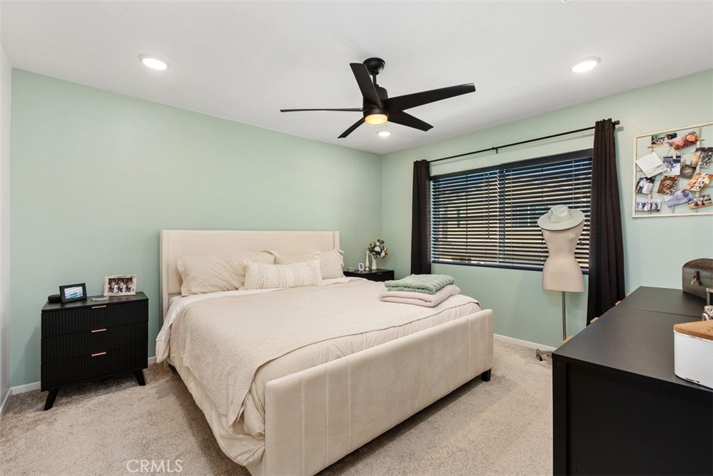 344 Zest Lane Fallbrook, CA 92028 - Photo 16 of 36 a bedroom with a bed and a window