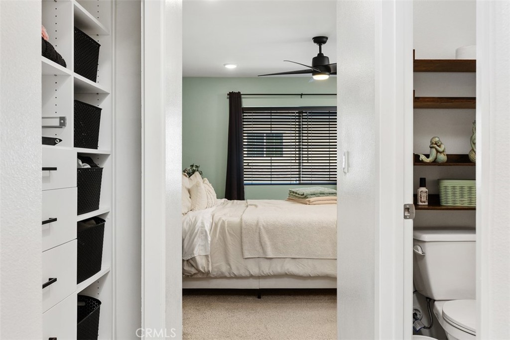 344 Zest Lane Fallbrook, CA 92028 - Photo 24 of 36 a bedroom with a bed and a window