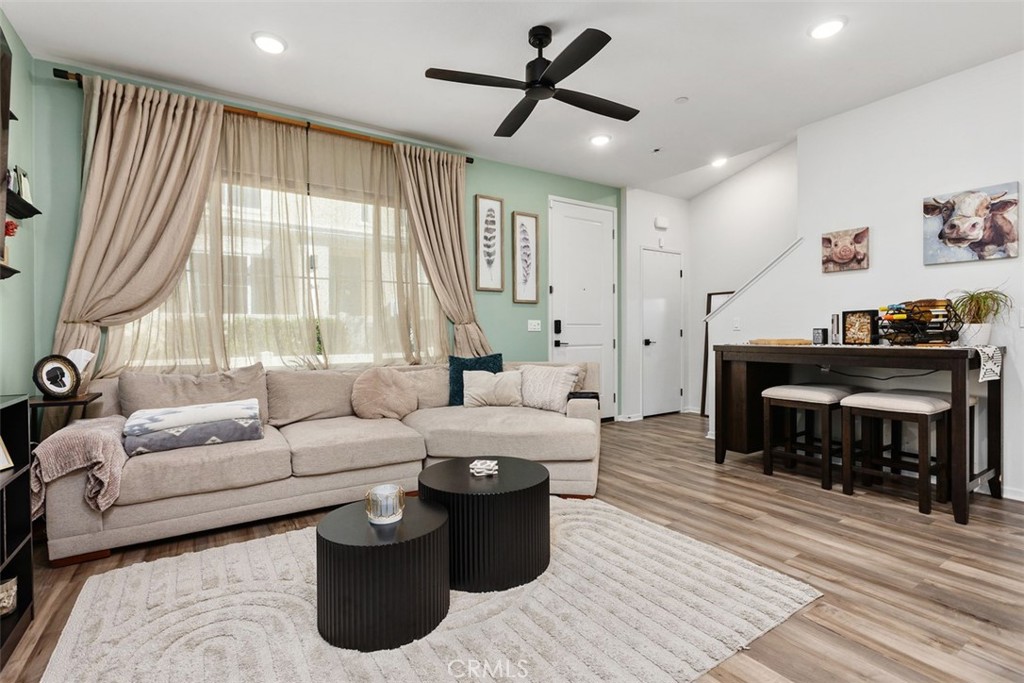 344 Zest Lane Fallbrook, CA 92028 - Photo 8 of 36 a living room with furniture and a fireplace