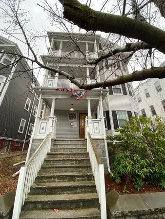 a view of a building with a street