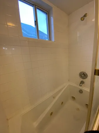 a bathroom with a bathtub