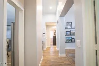 a bedroom with a bed and a mirror