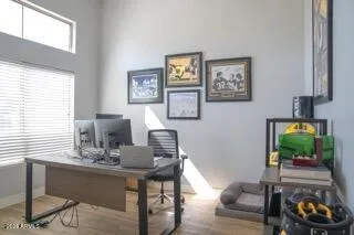 a workspace with furniture and a window