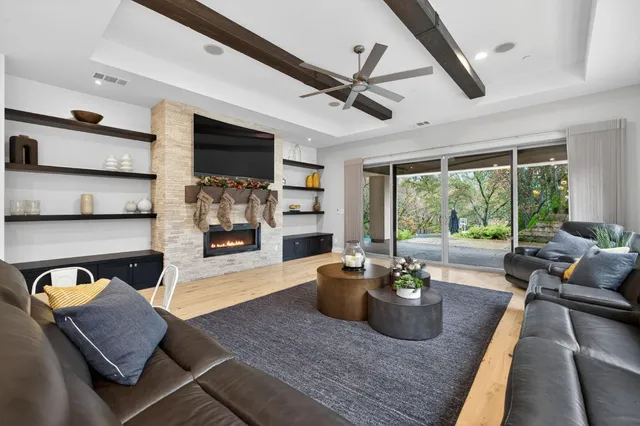 a kitchen with a refrigerator and cabinets