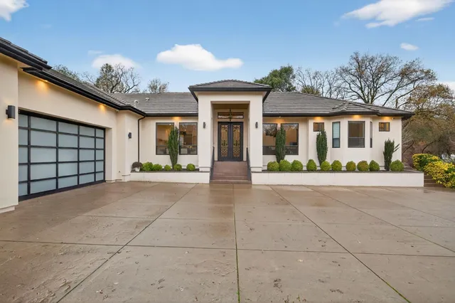 a view of a living room and entry way