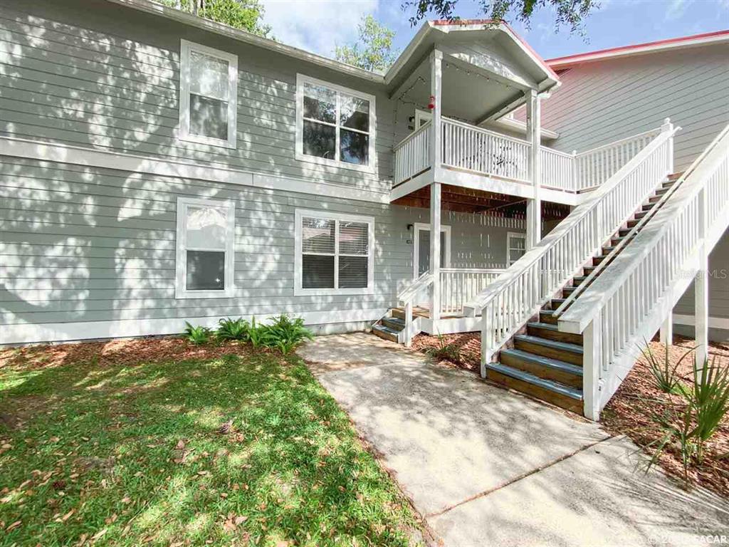 2905 Southwest Archer Road, Unit 4016 Gainesville, FL 32608 - Photo 1 of 1 a view of a building with a window