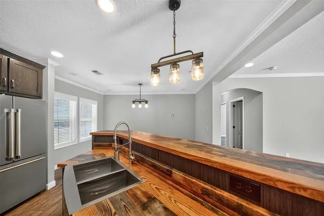 a living room with a bed furniture and a window