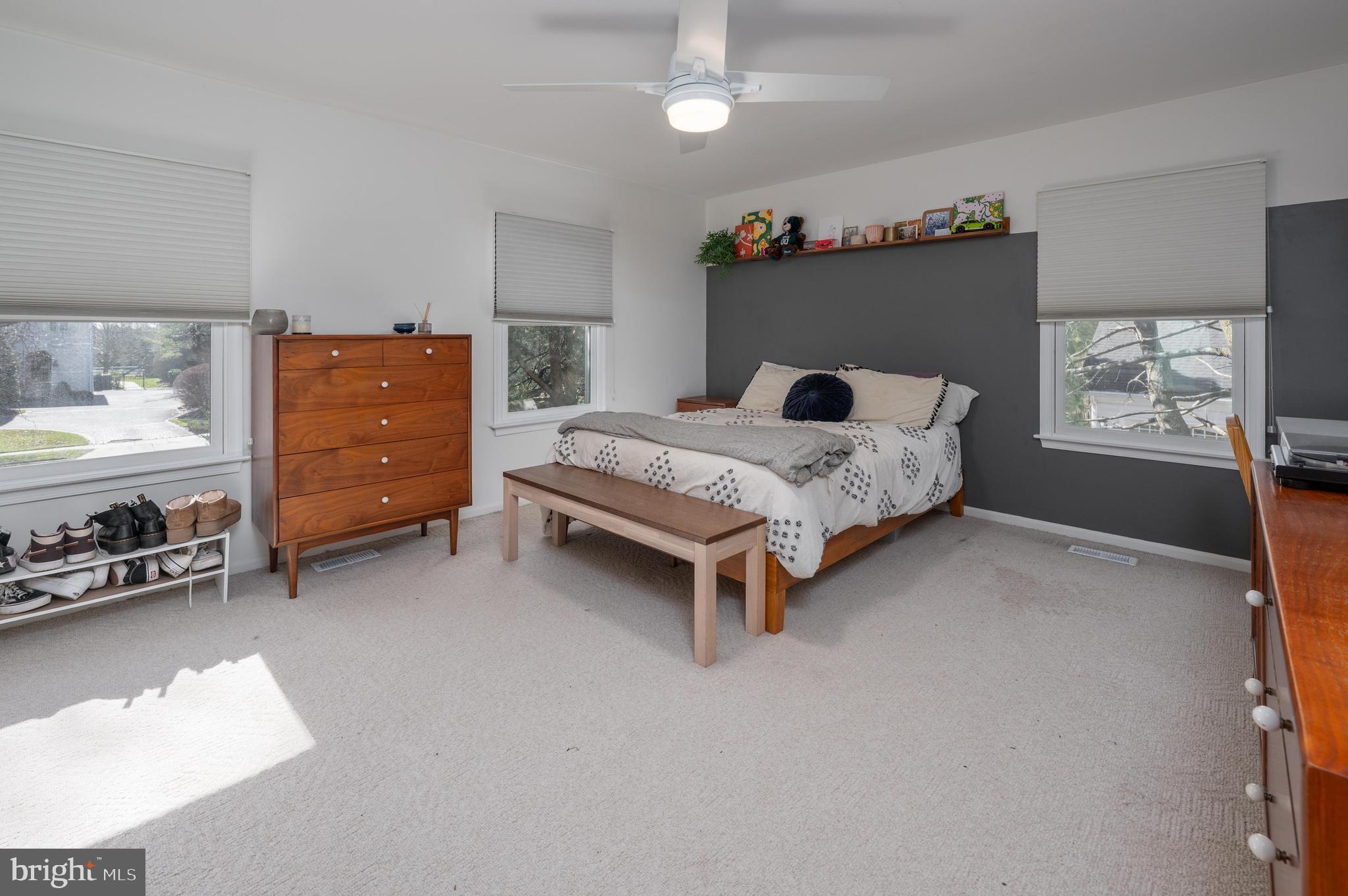 596 Sentinel Road Moorestown, NJ 08057 - Photo 23 of 31 a spacious bedroom with a bed and a cabinets