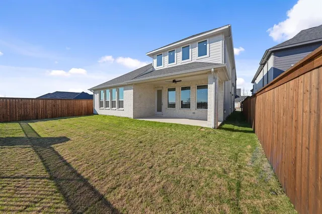 a front view of a house with yard