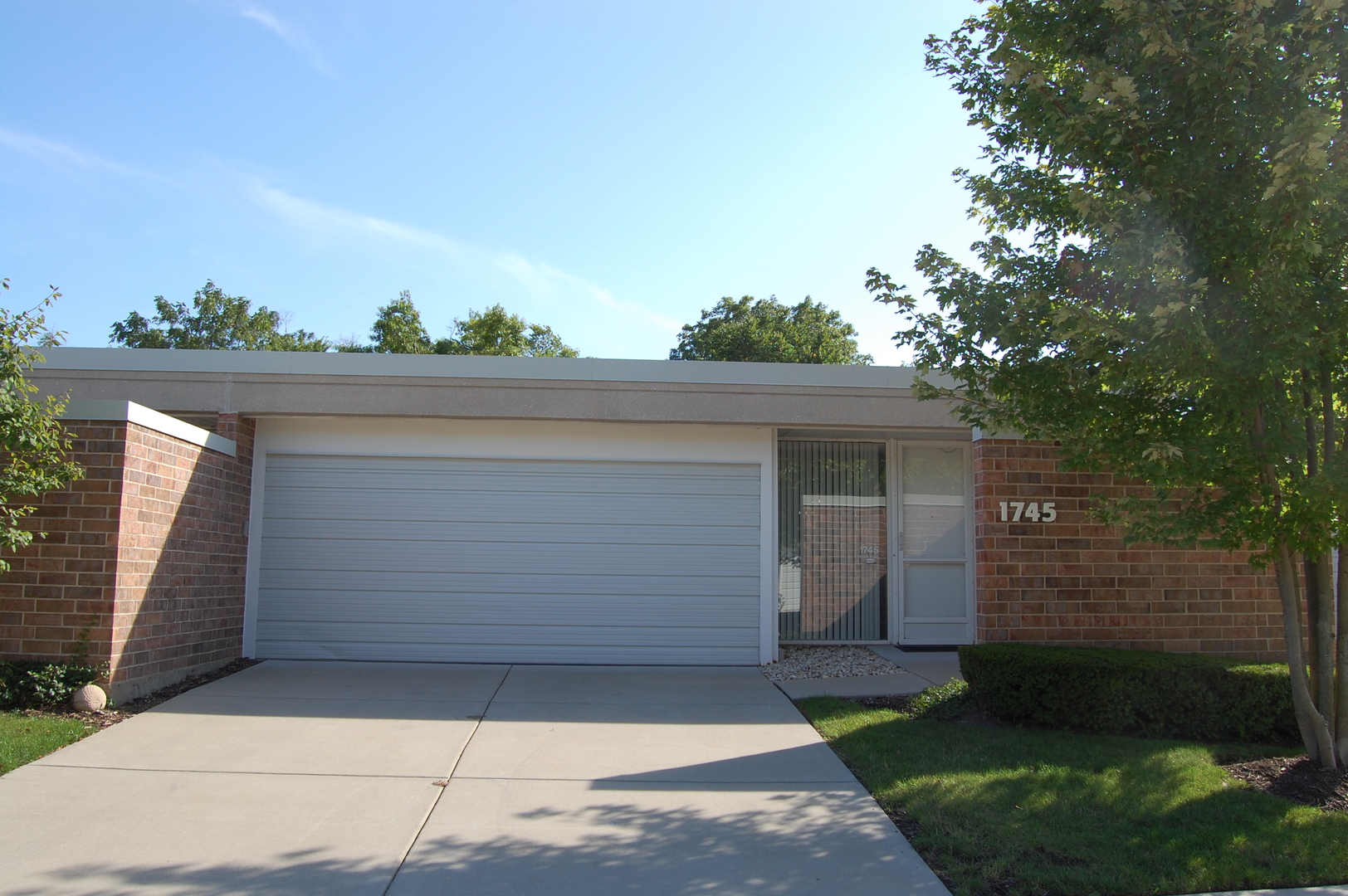 1745 Seton Road Northbrook, IL 60062 - Photo 1 of 1 a view of backyard of house and car parked