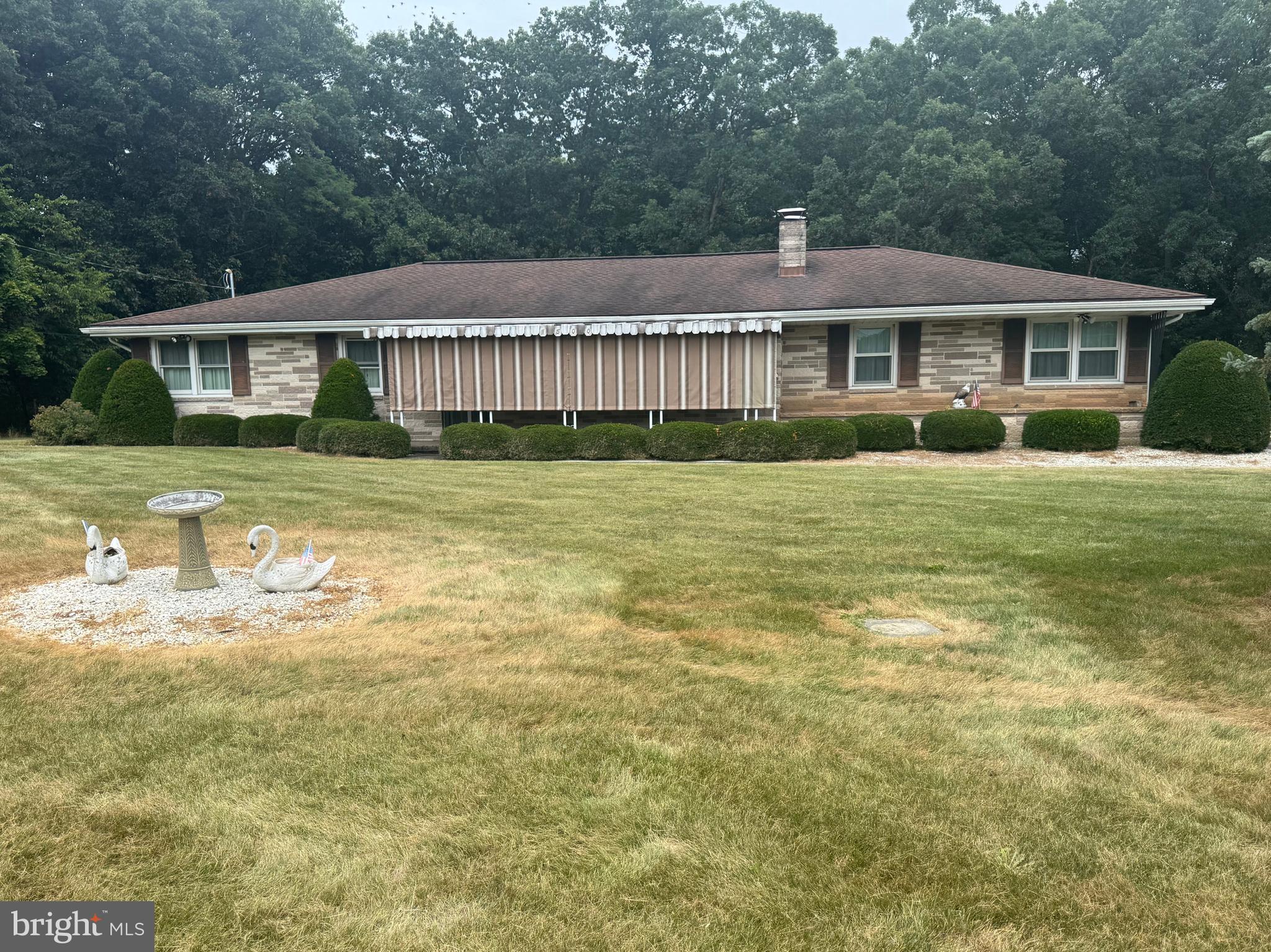 1500 Ridge Road Wellsville, PA 17365 - Photo 1 of 56 a front view of a house with a yard