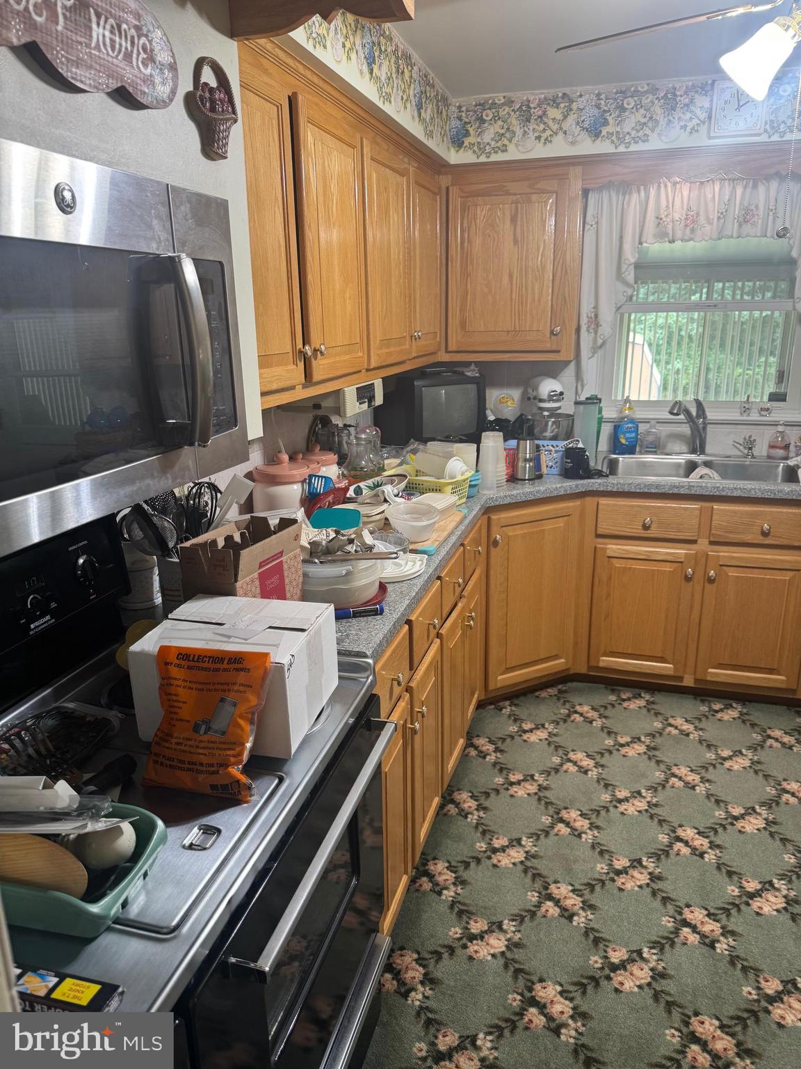 1500 Ridge Road Wellsville, PA 17365 - Photo 14 of 56 a kitchen with sink stove and cabinets