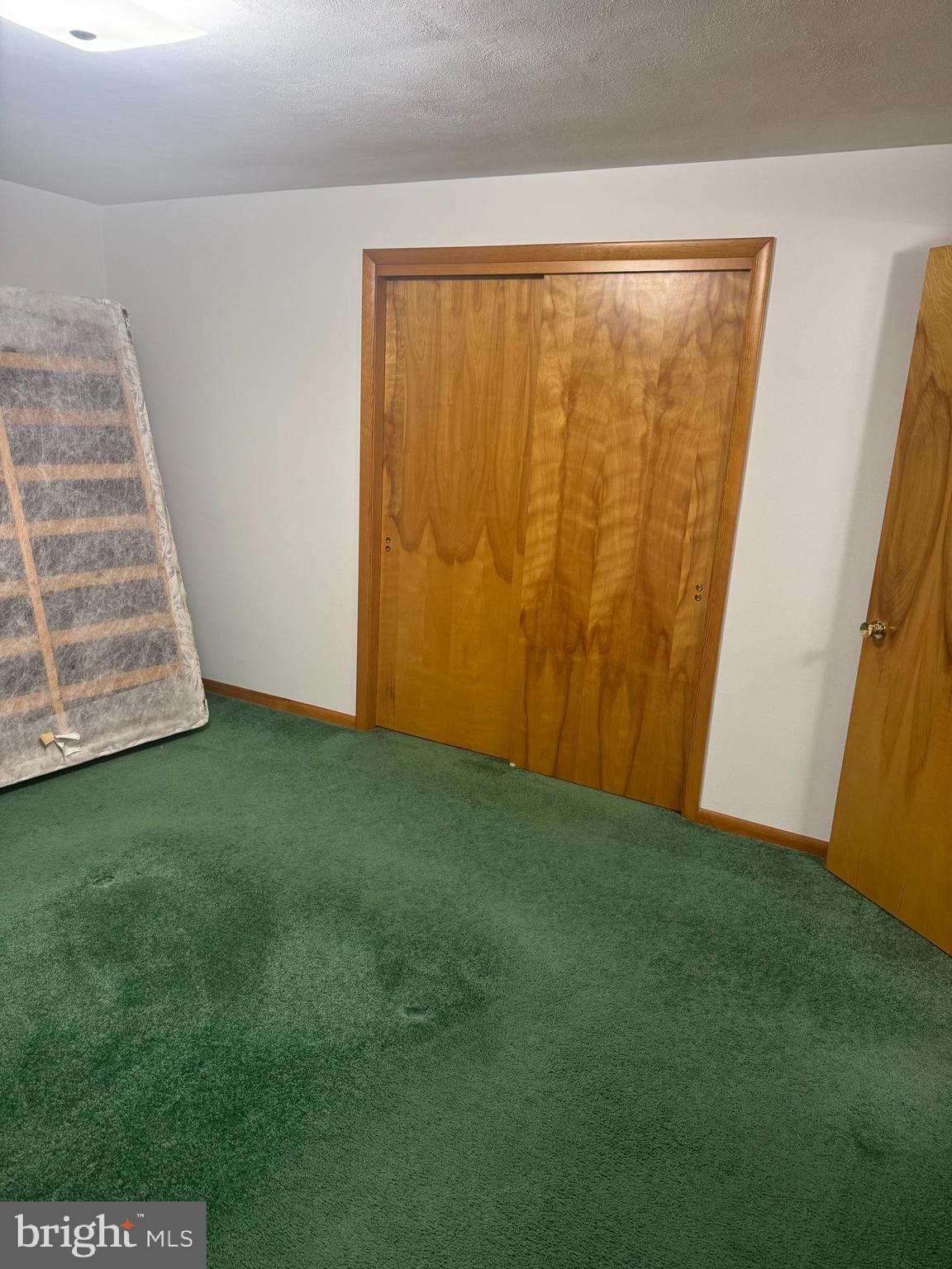 1500 Ridge Road Wellsville, PA 17365 - Photo 19 of 56 a view of an empty room with wooden floor and a window