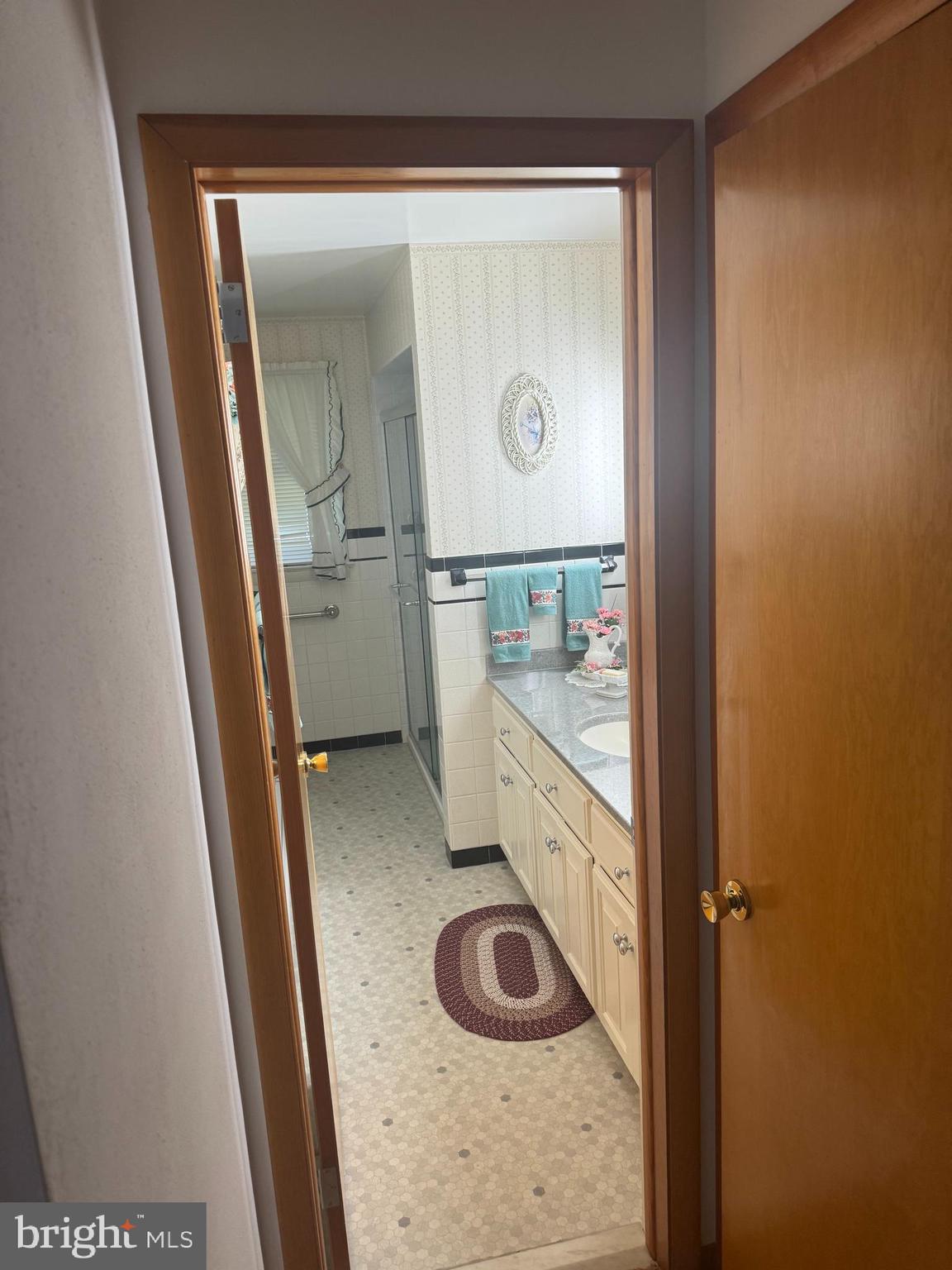 1500 Ridge Road Wellsville, PA 17365 - Photo 21 of 56 a bathroom with a sink and a mirror