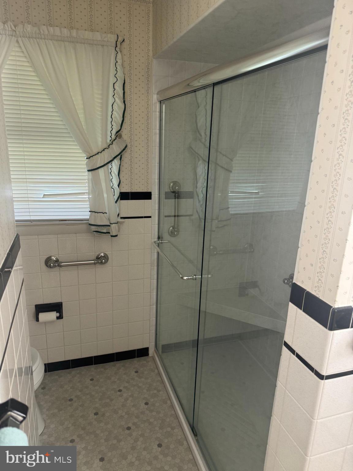 1500 Ridge Road Wellsville, PA 17365 - Photo 23 of 56 a bathroom with a shower and a mirror